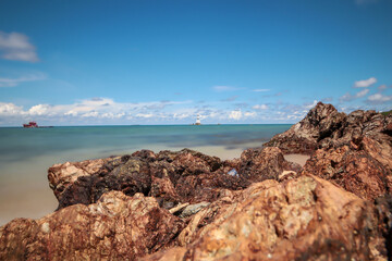 Rocks in the sea and blue sky