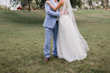 Fototapeta premium bride and groom in the park together