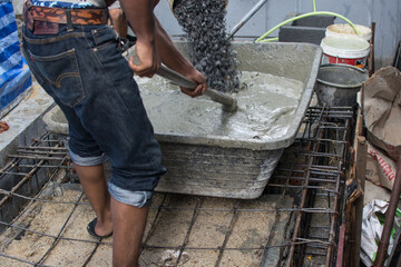 Mixing a cement in salver for applying construction