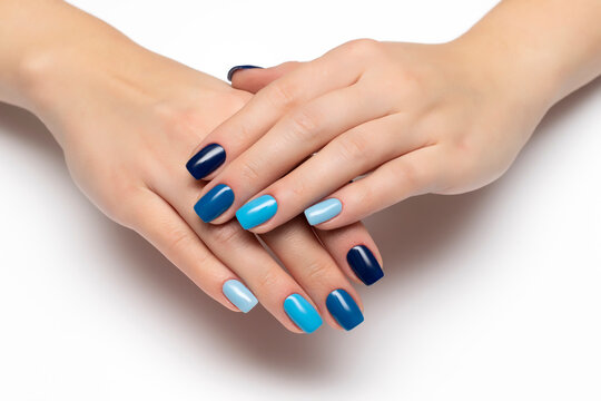 Gel Nail Design. Multi-colored Blue Manicure From Dark To Light On Long Square Nails.