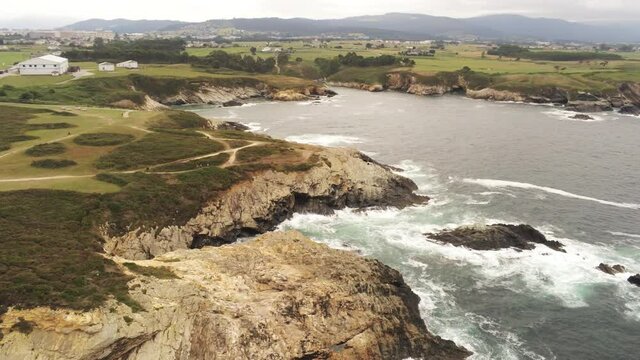 Waves Crashing On Rocks. Aerial Drone Footage