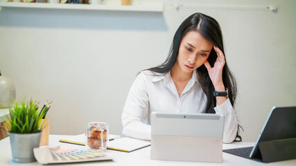 Beautiful young asian woman at home thinking looking tired and bored with depression problems with crossed arms..