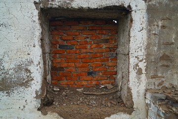 old brick wall with window