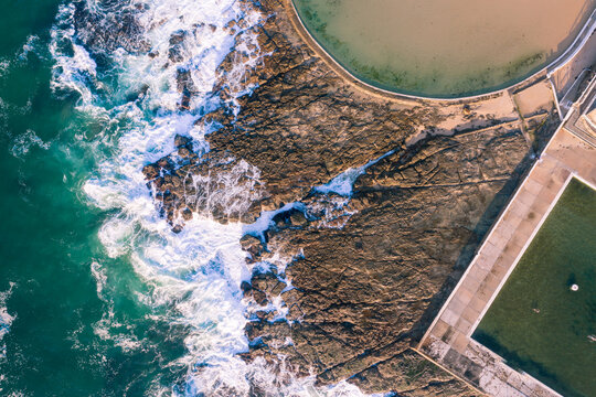 Newcastle Ocean Baths - Newcastle NSW Australia. Aerial view of the ocean baths and rock platform