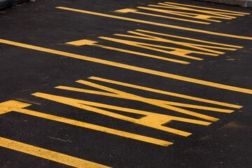 taxi carpark yellow lane on asphalt