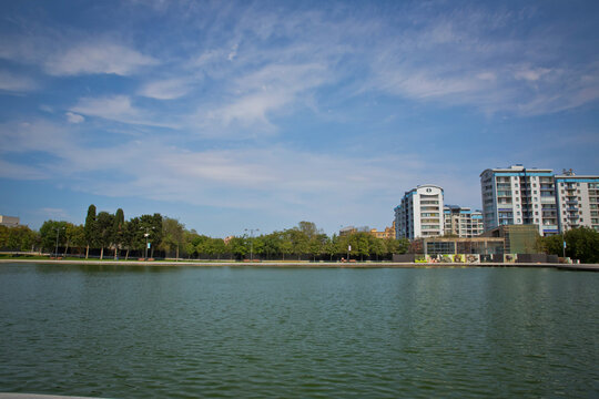 Baku zoological park . Bak Zooloji Park . artificial lake in the park Dede Korkud . Light clouds with blue sky . Dada Korkut Park .