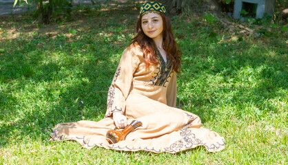 Armenian young woman in traditional clothes with small spot