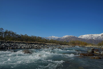 typical mountain landscape of Japanese alps in Hakuba at early Autumn