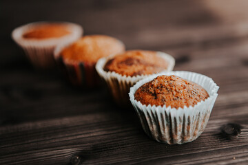 homemade cakes, cupcakes with different fillings on a dark background