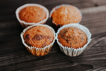 homemade cakes, cupcakes with different fillings on a dark background