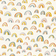 Obraz premium Cute childish rainbows pattern. Nursery pattern for children. Scandinavian wallpaper for kids.