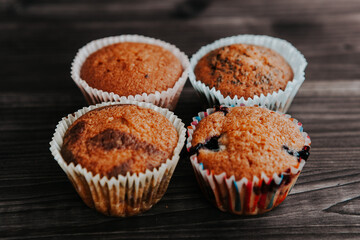 homemade cakes, cupcakes with different fillings on a dark background