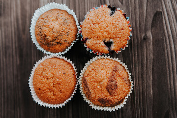 homemade cakes, cupcakes with different fillings on a dark background