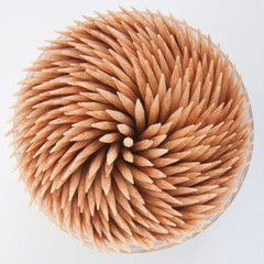 a close up top view on a round box of toothpicks