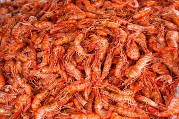 Natural background with lots of red cooked prawns