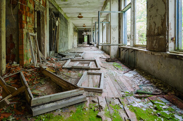 Corridor of abandoned school in resettled village of Pogonnoe in exclusion zone of Chernobyl nuclear power plant, Belarus