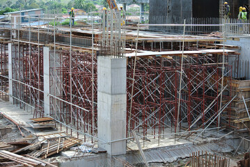 JOHOR, MALAYSIA -APRIL 13, 2016: Scaffolding used as the temporary structure to support platform, form work and structure at the construction site. Also used it as a walking platform for workers. 


