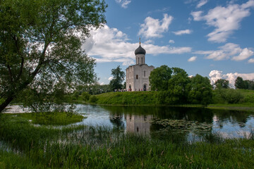 Fototapeta na wymiar View of the Church of the Intercession on the Nerl River. Vladimir region. Russia.