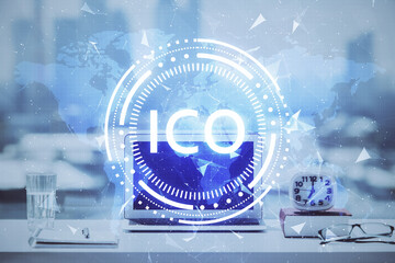 Double exposure of blockchain and crypto economy theme hologram and table with computer background....