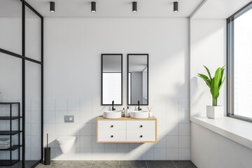 White and black bathroom, sink and toilet