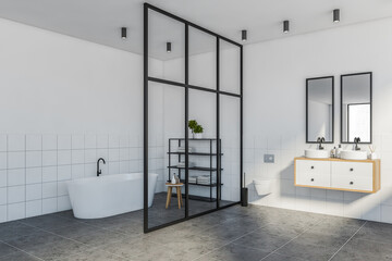 White and black bathroom corner, tub and sink