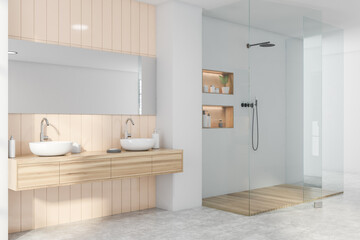 Grey and beige bathroom corner, sink and shower