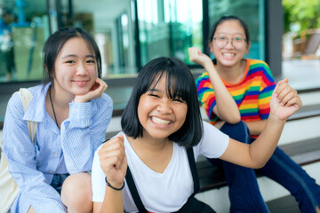 three asian teenager happiness face outdoor