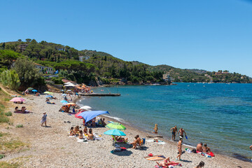 Fototapeta na wymiar small natural beaches of Porto Santo Stefano