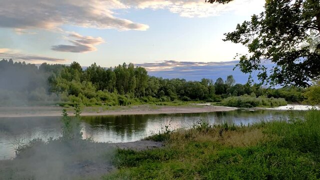 Ufa, Russia July 20, 2020 view of the reservoir from the hilly coast on a summer evening