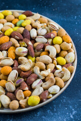 Nuts mix, beer snack on the bowl.