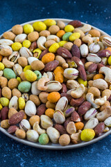 Nuts mix, beer snack on the bowl.