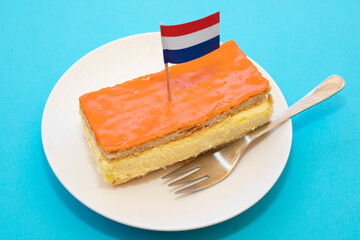 Orange tompouce. Traditional Dutch pastry to celebrate King's Day in the Netherlands.