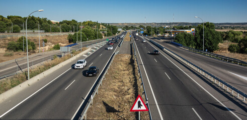 Exit road from Madrid to Valencia during a summer departure operation with a multitude of vehicles