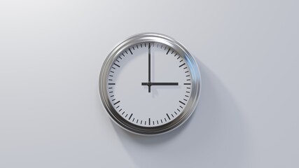 Glossy chrome clock on a white wall at three o'clock. Time is 03:00 or 15:00