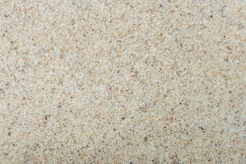 Sand and stone pieces texture background.