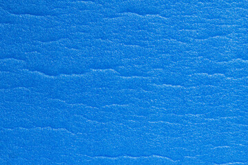 Blue foam mattress texture background.
