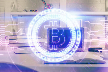 Multi exposure of blockchain theme hologram and table with computer background. Concept of bitcoin...