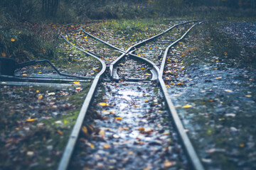 narrow gauge railway - railway turnout - rails in the autumn forest, rainy weather