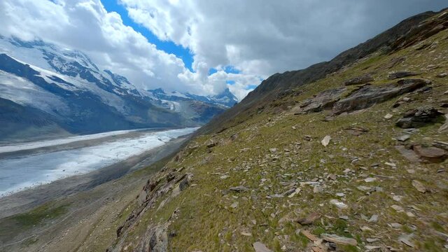 Drone Flying Down Towards The Wonderful Gorner Glacier In Zermatt, Switzerland In Winter - FPV drone shot