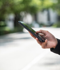 Close up of woman hand using mobile phone