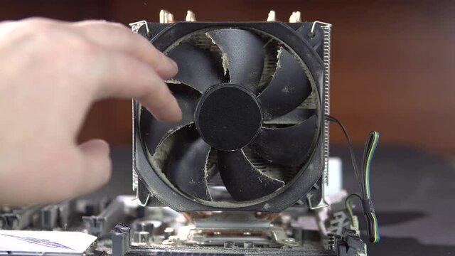 Demonstration of dust pollution. Dirty cooler and CPU heatsink from dust. 4k.