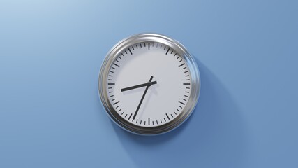 Glossy chrome clock on a blue wall at thirty-four past eight. Time is 08:34 or 20:34