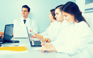 Meeting of doctors in conference room