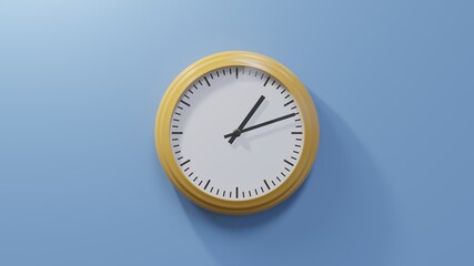 Fototapeta na wymiar Glossy orange clock on a blue wall at twelve past one. Time is 01:12 or 13:12