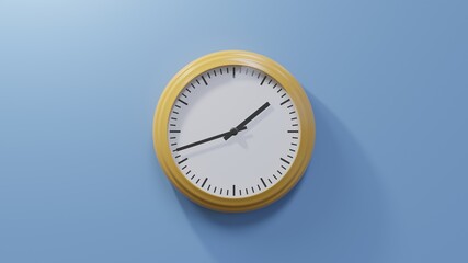 Glossy orange clock on a blue wall at forty-two past one. Time is 01:42 or 13:42