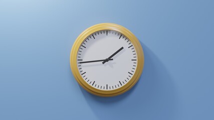 Glossy orange clock on a blue wall at forty-four past one. Time is 01:44 or 13:44