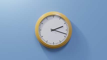 Glossy orange clock on a blue wall at eighteen past two. Time is 02:18 or 14:18