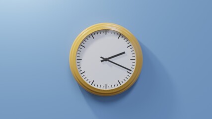 Glossy orange clock on a blue wall at nineteen past two. Time is 02:19 or 14:19