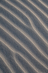 Fototapeta na wymiar Abstraktes Muster im Sand vom Wind geformt