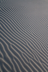 Obraz premium Abstraktes Muster im Sand vom Wind geformt